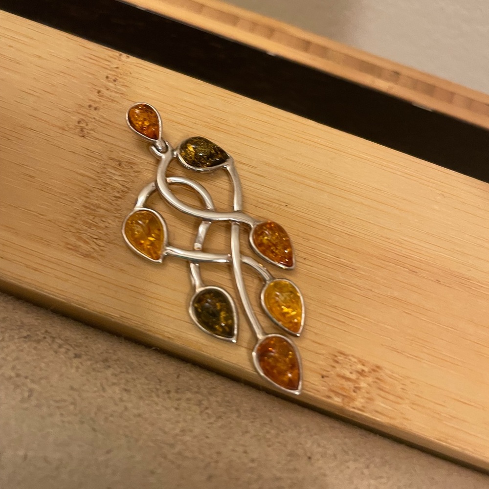 Amber stones sterling silver charm